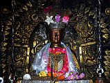 Kathmandu Patan Golden Temple 25 Shakyamuni Buddha In Main Temple Close Up 2010 